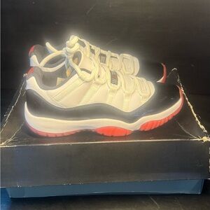 White and Black Sneakers with Red Accents